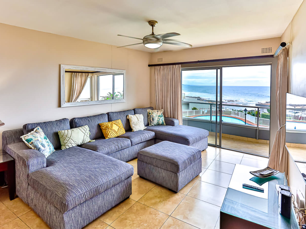 Lounge with ocean and pool views in a Cyberview Letting apartment