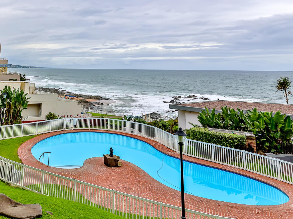 Bedroom with ocean-view balcony in a Cyberview Letting apartment